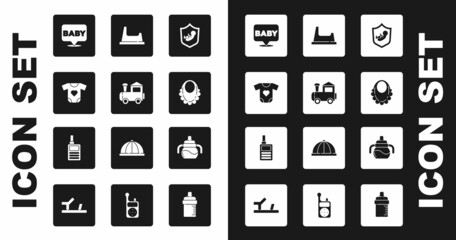 Set Baby on shield, Toy train, clothes, bib, potty, bottle and Monitor Walkie Talkie icon. Vector