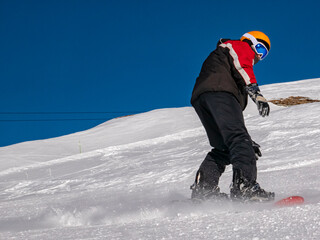 Snowboarder on a ski slope