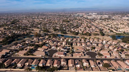 Poster Afternoon aerial view of suburban homes in Surprise, Arizona, USA. © Matt Gush