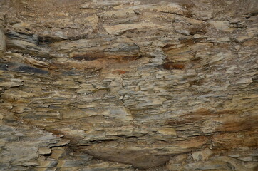 The texture of a flat stone as a background.