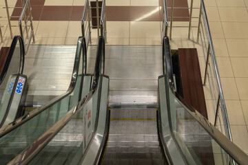 Escalator stairs in a shopping mall.
