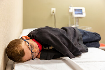 Sick child at doctor office during pandemic