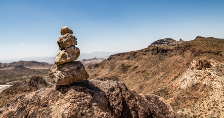 Fototapeta na wymiar Balanced rocks before a canyon landscape environment.