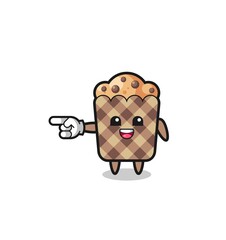 muffin cartoon with pointing left gesture