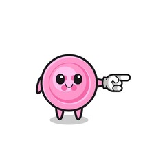clothing button mascot with pointing right gesture