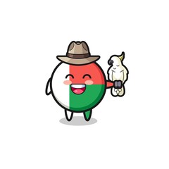 madagascar flag zookeeper mascot with a parrot