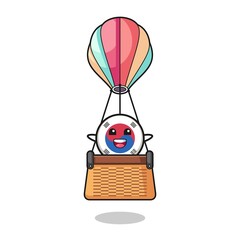 south korea flag mascot riding a hot air balloon