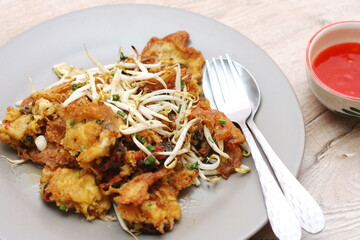 Oysters fried in egg batter, Pan-fried crispy mussel with bean sprout, Crispy Mussel and Beansprout Pancake
