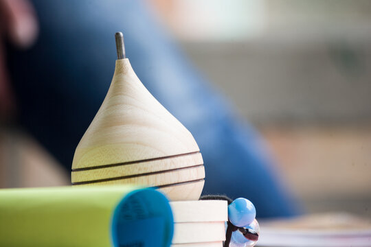 Close-up of traditional Colombian games and one of them is the marvelous trompo.