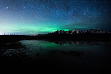 Naklejka na ściany i meble Northern Lights or Aurora Borealis in Alaska