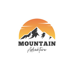 Mountain Logo Vector Design Inspiration. Sunset above mountains peak silhouette