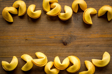 Frame of Chinese New Year fortune cookies flat lay. Top view