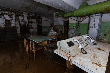 abandoned rotten shelter underground with equipment - obrazy, fototapety, plakaty