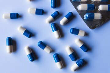 Capsules over a white background. Medical and pharmaceutical concept 