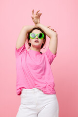 attractive young woman Youth clothing green sunglasses posing modern style