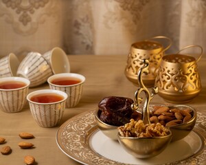 Dates and nuts with Arabic coffee to celebrate Eid.