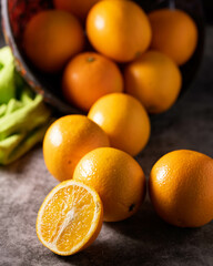 Soft light photo of an abundance of oranges.