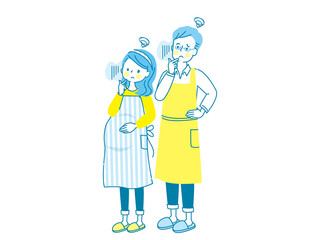 お腹の中の赤ちゃんを心配する妊婦と寄り添う夫