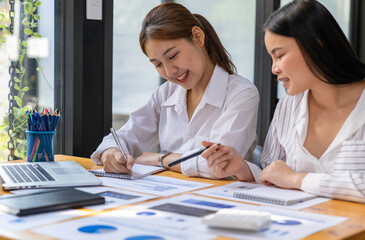 Business People Talking Discussing with coworker planning analyzing financial document data charts and graphs in Meeting and successful teamwork Concept.