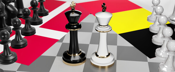 Denmark and Belgium - talks, debate, dialog or a confrontation between those two countries shown as two chess kings with flags that symbolize art of meetings and negotiations, 3d illustration