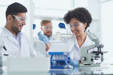 Fototapeta premium Team of Medical Research Scientists Working on Generation Experimental Drug