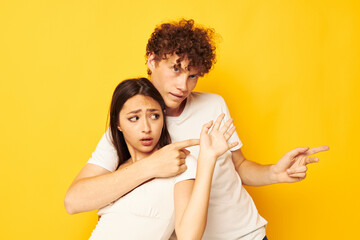 portrait of a man and a woman posing together in white t-shirts friendship Lifestyle unaltered