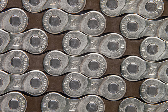 New KMC bicycle chain for the whole frame. Background image