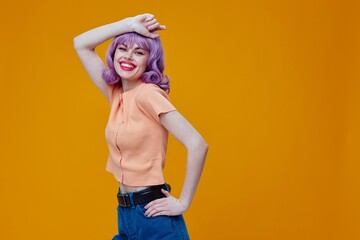 Pretty young female purple hair fashion posing glamor color background unaltered