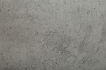 Background Stone wall background with abstract spots. Beautiful gray marble texture with stains, abstract surface background. Finishing stone for building cladding. Furniture granite.
