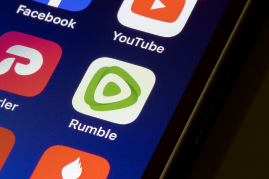 Portland, OR, USA - Jan 14, 2022: Rumble mobile app icon is seen on an iPhone. Rumble is a Canadian online video platform headquartered in Toronto and is popular among American right-leaning users.