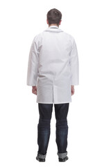 Male doctor walking isolated over a white background -side view