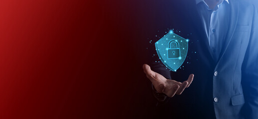 Businessman hold low poly polygon shield with a padlock icon.Secure Access System Concept.Business...