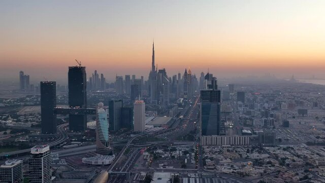 Aerial sunset view of Dubai city skyline