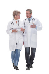 Doctors having a discussion while walking