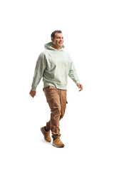 Full length shot of a smiling man in casual wear walking