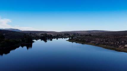 Sunrise over Bulshoek Dam in Clanwilliam, South Africa.