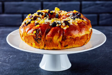 sweet bread wreath sprinkled with fruits and nuts