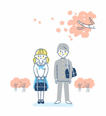 中学生の男女と桜