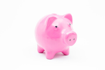 Pink piggy bank on isolated white background.