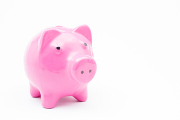 Pink piggy bank on isolated white background.