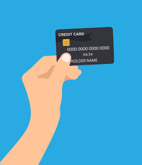 Human hand holding credit card