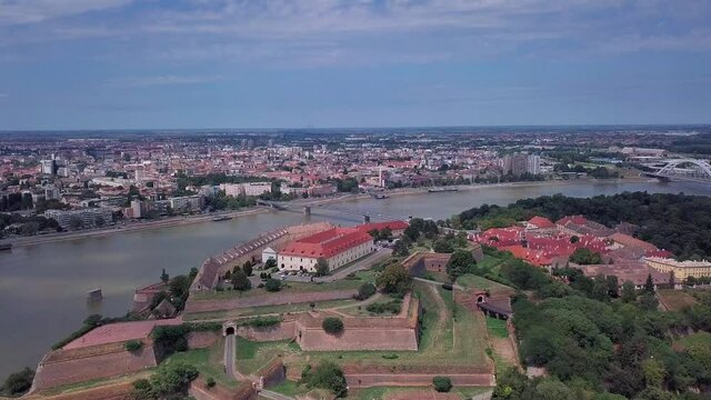The drone aerial footage of Danube river runs through Petrovaradin fortress and Novi Sad city, Serbia.