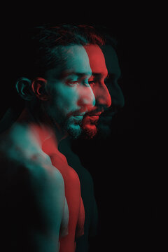 Male portrait with double color. Double exposure of color. Male portrait on a black background with creative processing.