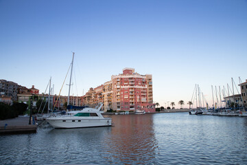 VALENCIA , SPAIN - DECEMBER 8, 2021: traditional buildings of Port Saplaya  the Little Venice near Valencia  Spain