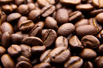 Naklejka premium roasted coffee beans background