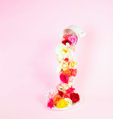 Flower Waterfall From Cup, on pink background.