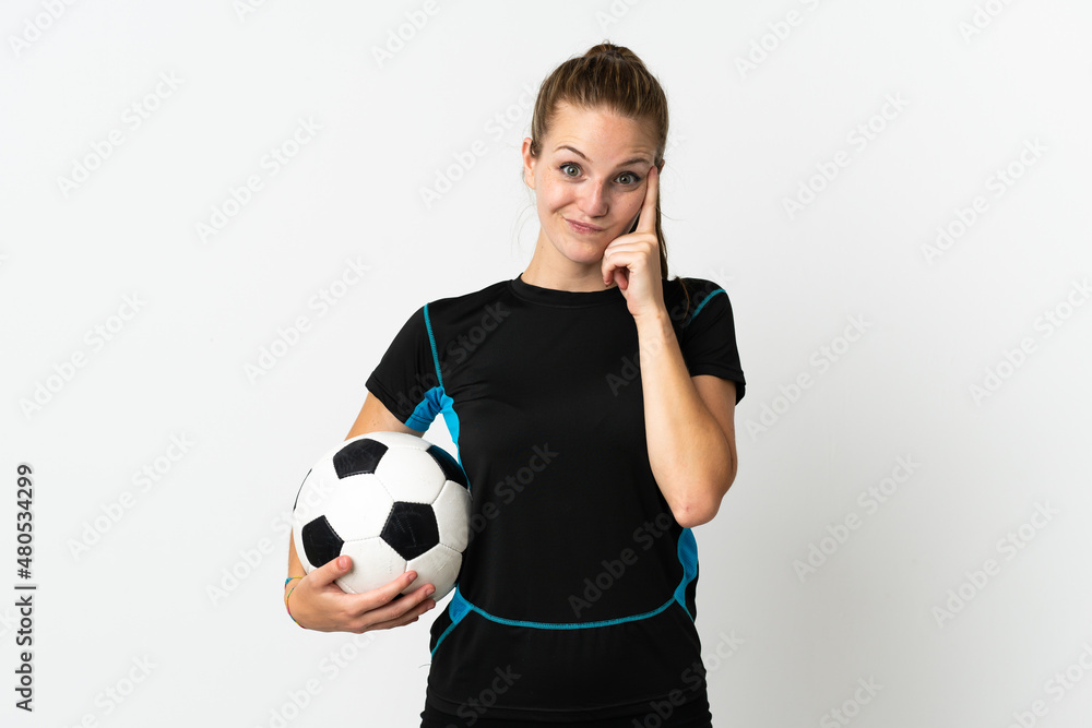 Canvas Prints Young football player woman isolated on white background thinking an idea