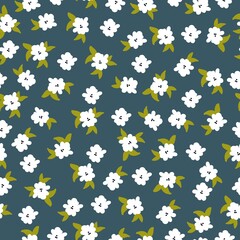Beautiful vintage pattern. White flowers. Green leaves. Blue background. Floral seamless background. An elegant template for fashionable prints.