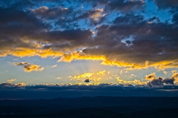 Fototapeta premium Dramatic Sunset Over the Hills of Tuscany Italy