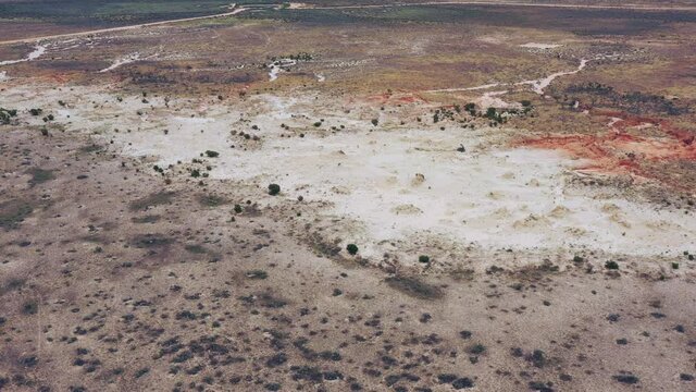 Red rocks lookout and aerial scenic view of dry creek of arid Lake Mungo 4k.